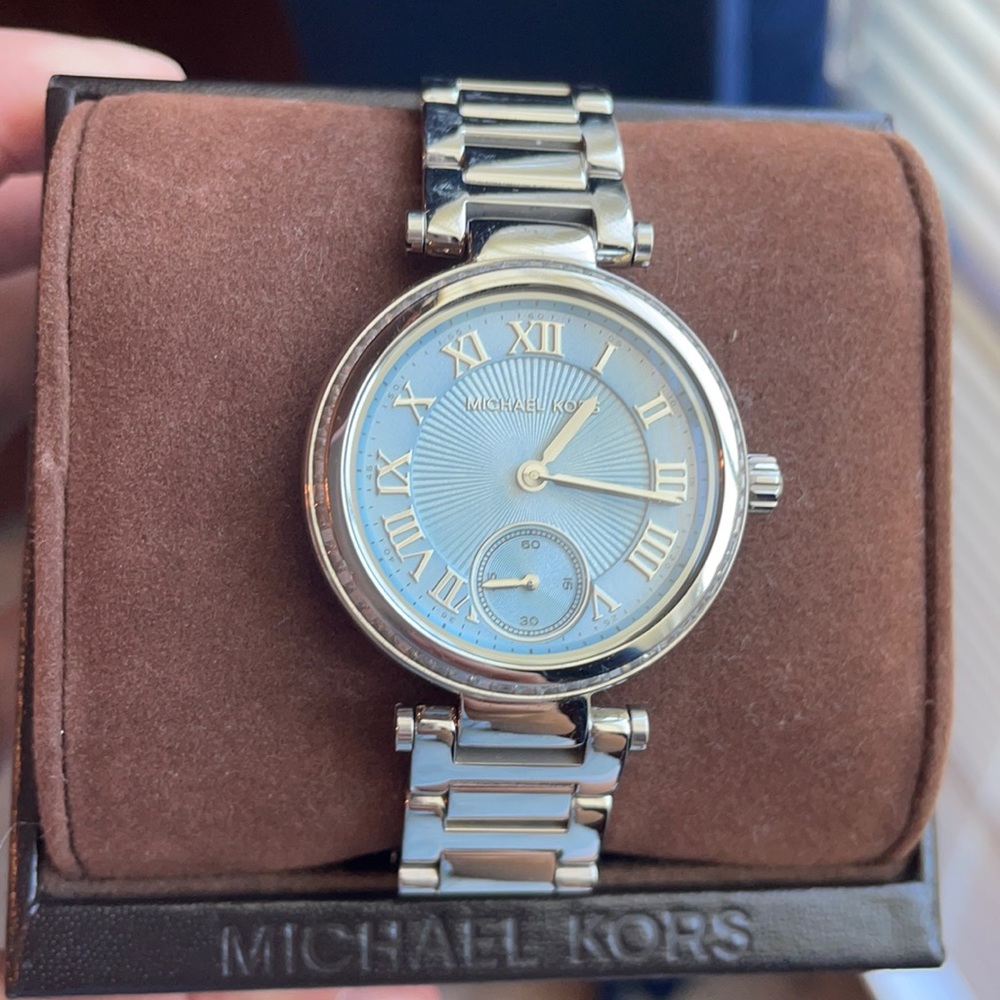 Michael Kors silver with light blue center watch